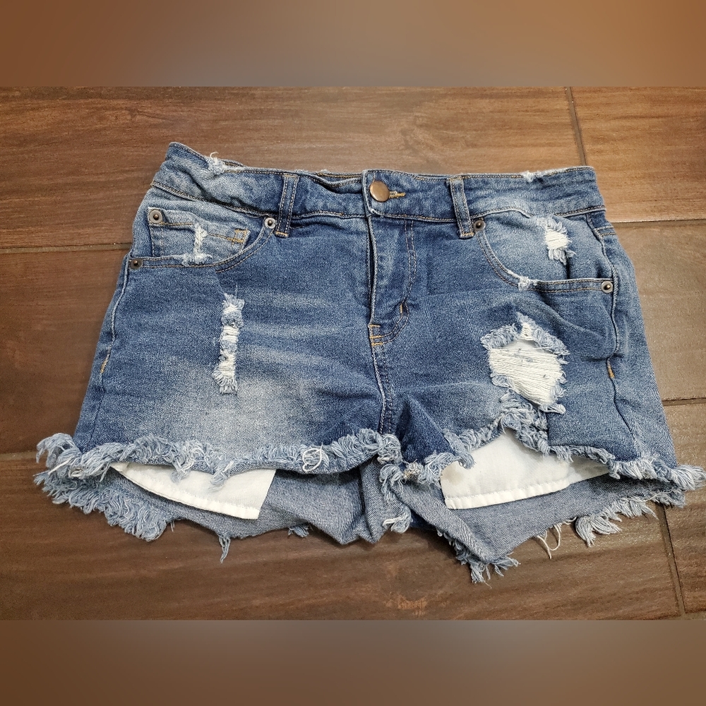 H&M jean shorts size 4 with exposed pockets with stretch , tag was remov…
